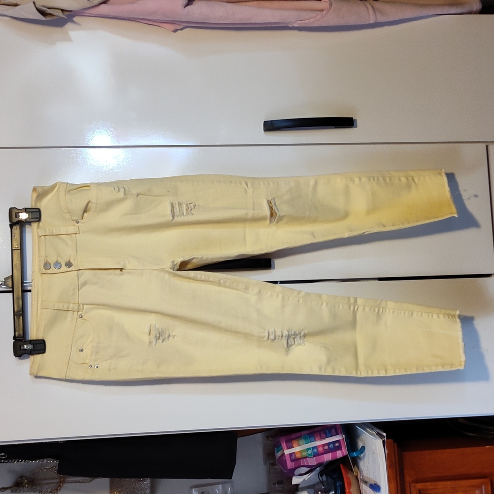 Yellow ripped stretch jeans